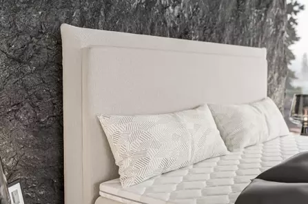 Eleganckie tapicerowane łóżko kontynentalne do sypialni CAMEL z pojemnikiem na pościel. Obniżka ceny!
