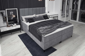 Tapicerowane łóżko kontynentalne ROMA z zagłówkiem z pionowymi przeszyciami